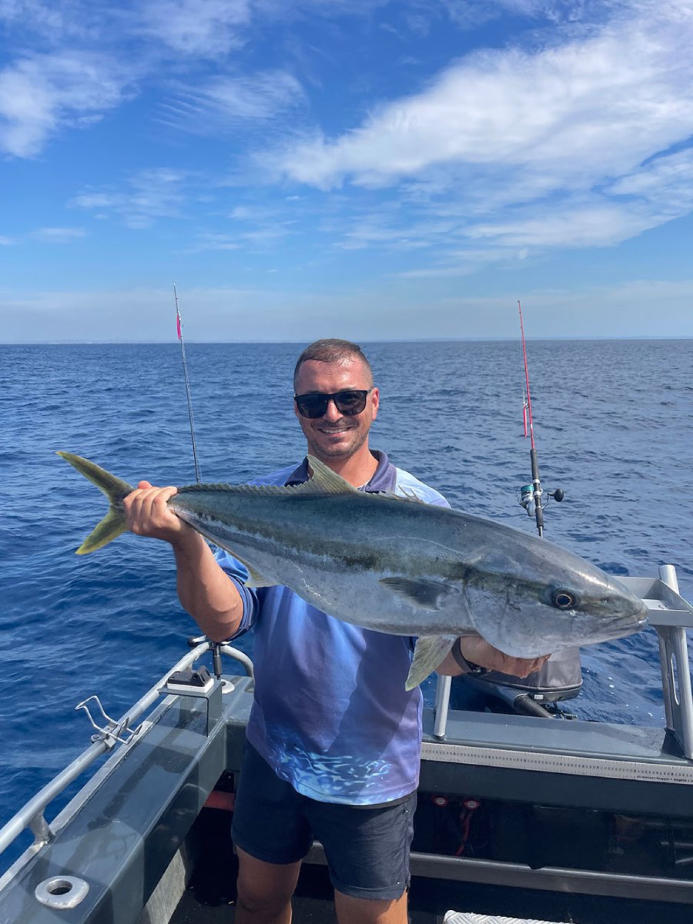 A kingfish landed on the deck